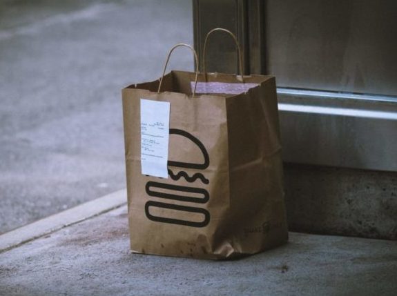 Food Order in Bag on Sidewalk